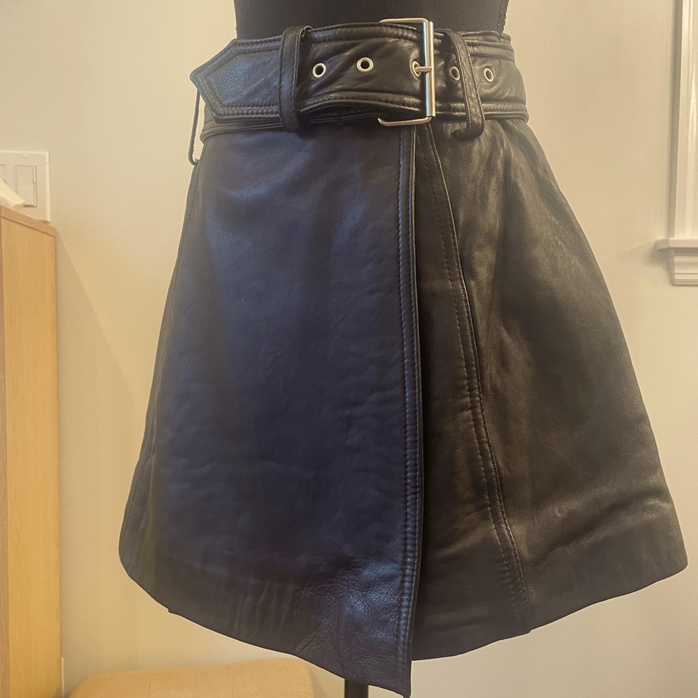 Black leather mini skirt